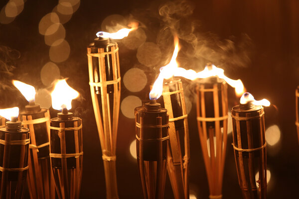Torches at night with yellow flames and highlights